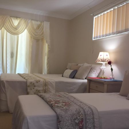 Theme Parks Amituofo Homestay غولد كوست الغرفة الصورة