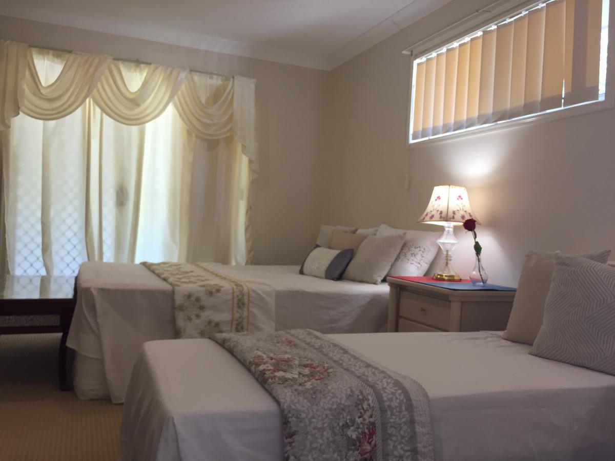Theme Parks Amituofo Homestay غولد كوست الغرفة الصورة